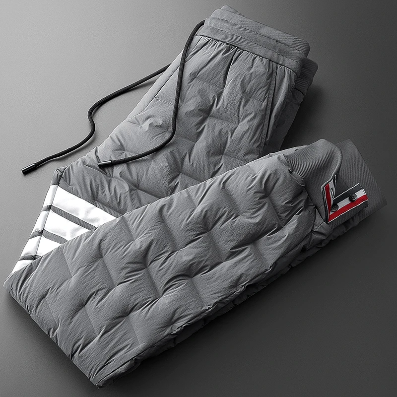 冬季加厚保暖防水压胶保暖裤子 男士时尚潮流束脚弹力羽绒裤外穿