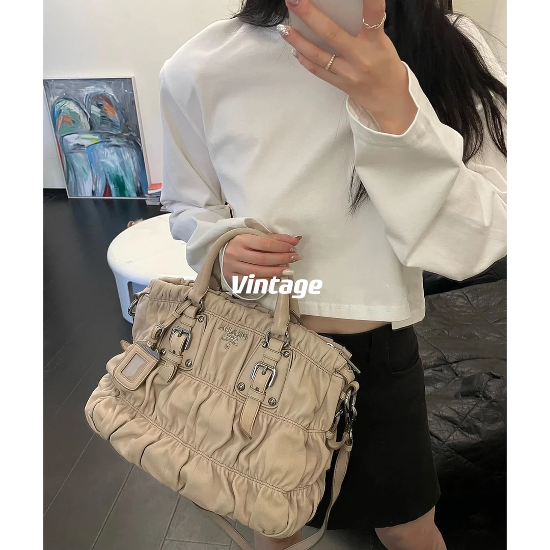 95新 Prada/普拉达 褶皱元宝手提斜挎包