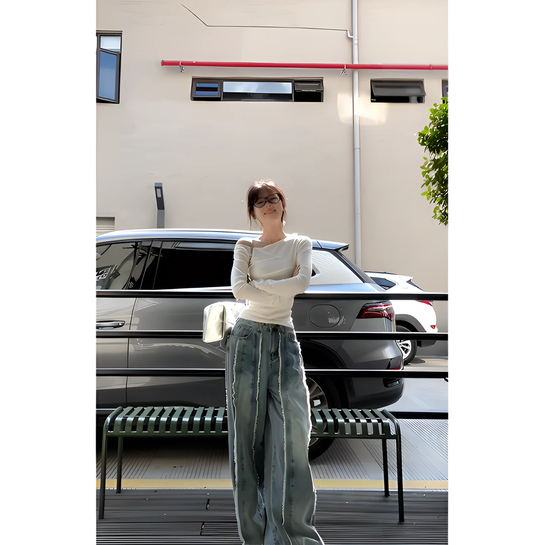 时尚穿搭女士秋季斜领长袖修身显瘦百搭小众上衣不规则设计牛仔裤