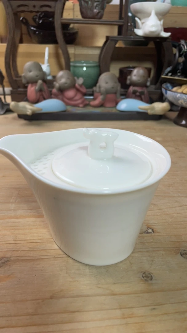 455羊脂玉瓷龙头宝平手抓壶