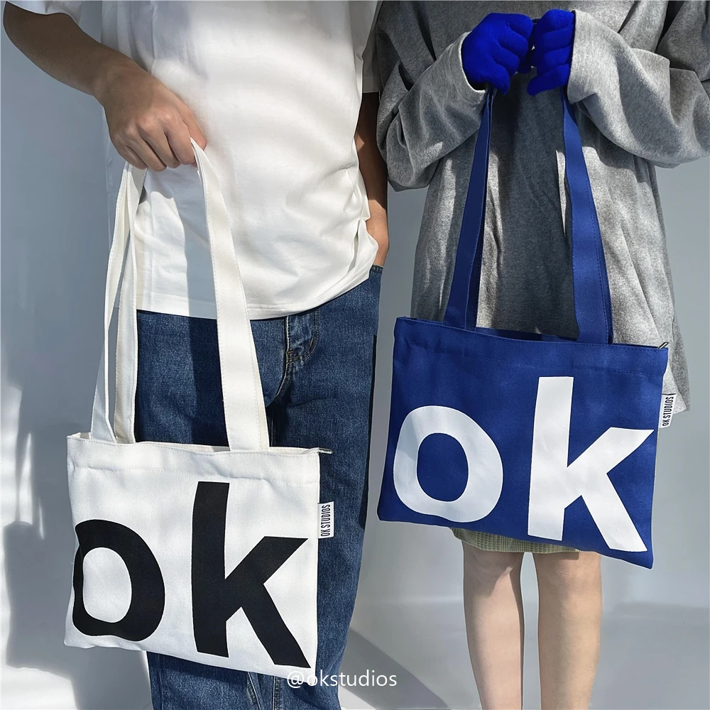 OK原创小众设计2024新款极简慵懒风单肩帆布包潮男四季手提布袋女