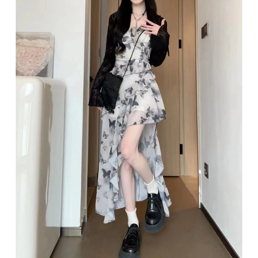 辣妹蝴蝶碎花吊带裙子女2025春夏新款不规则收腰荷叶边雪纺连衣裙