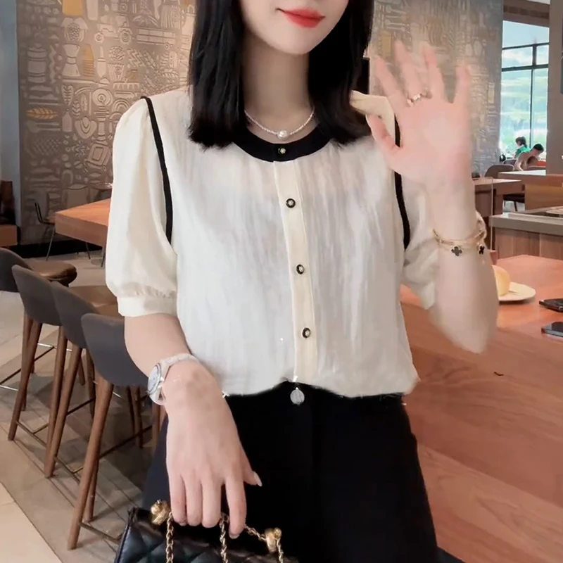 短袖拼色衫女2024夏新款爆款小众显瘦衬衣气质设计感泡泡袖上衣