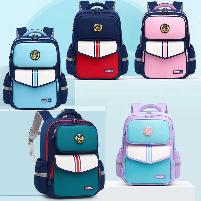 新款小学生书包1-3-6年级轻便男女孩肩负护脊英伦风双肩儿童背包A
