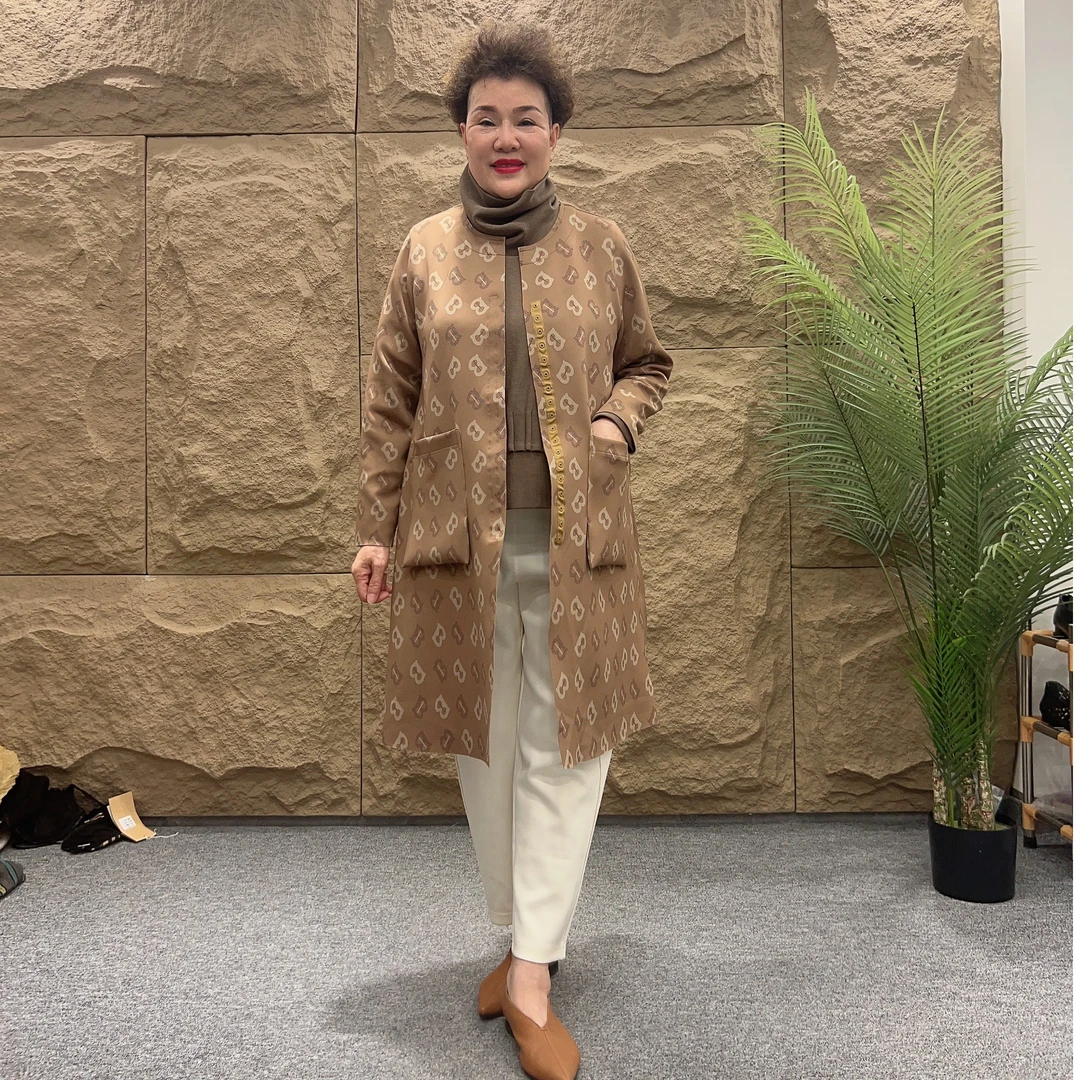 MZRY NIUJIE 2023气质中长款字母空气层中长款风衣