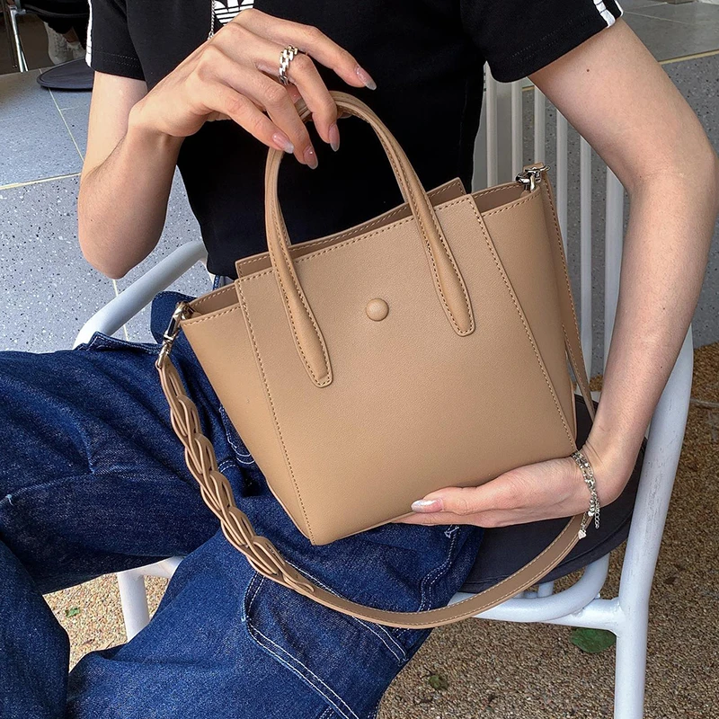 希哥家  新款牛皮撞色质感时尚百搭单肩斜挎手提女士手提包  6676