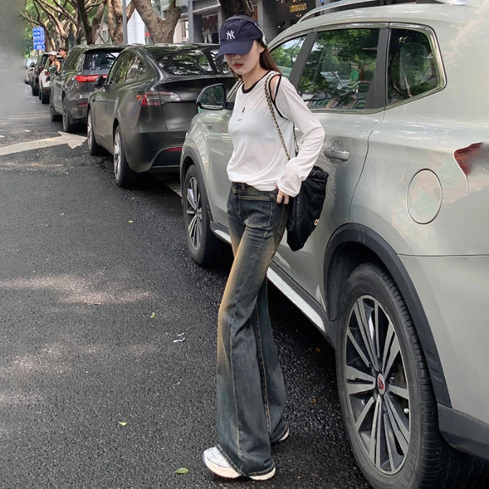 复古韩欧尼做旧黄泥染低腰拼接秋冬季低弹微喇牛仔裤泰酷辣设计感