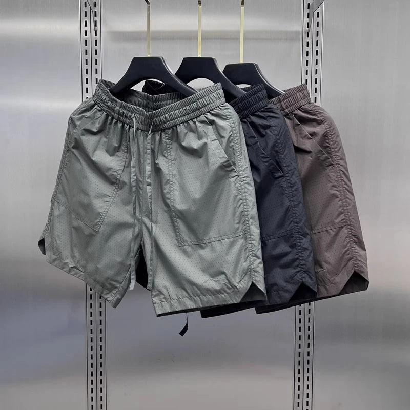 肥佬夏季薄款透气运动短裤300斤男士潮流百搭网孔沙滩裤大码裤子