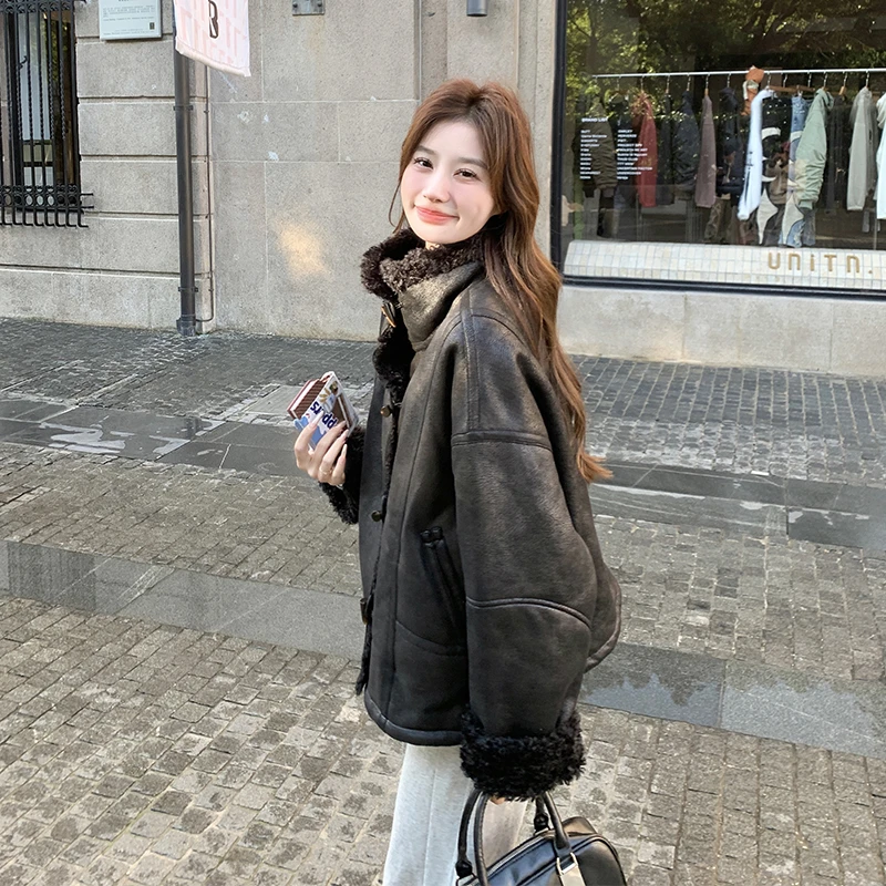 黑色麂皮绒皮毛一体外套女冬季2025年新款加厚超好看机车服上衣