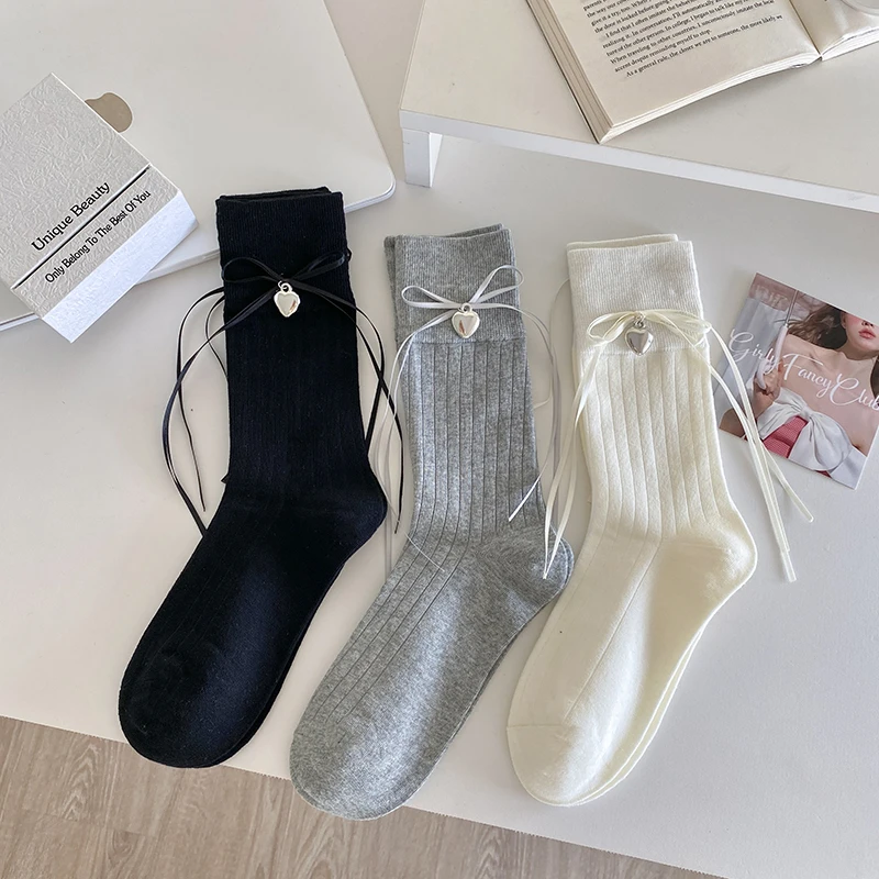 袜子女中筒袜堆堆袜可爱蝴蝶结纯棉春秋爱心吊坠搭配小皮鞋袜子女
