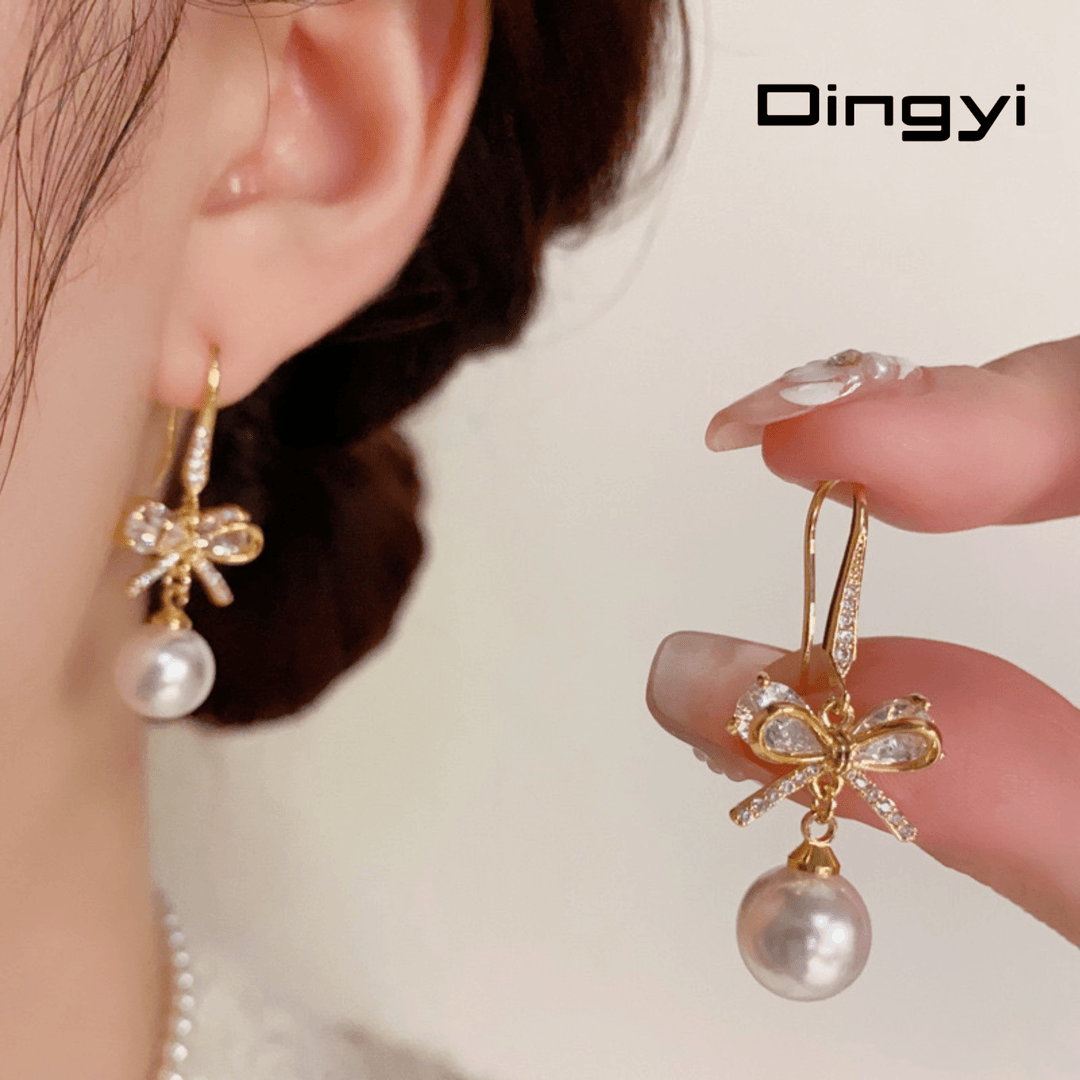 铜合金合成锆石耳饰 小众时尚设计感微镶锆石蝴蝶结珠珠耳坠精致