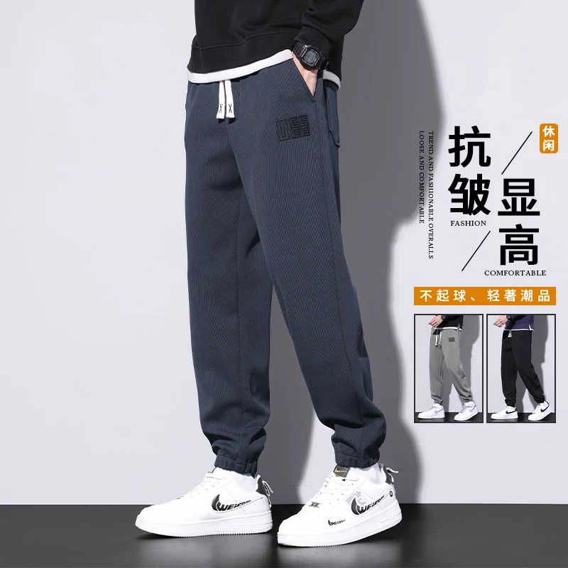 啄木鸟束脚休闲裤男2023秋冬季新款宽松裤子男士美式潮牌百搭长裤