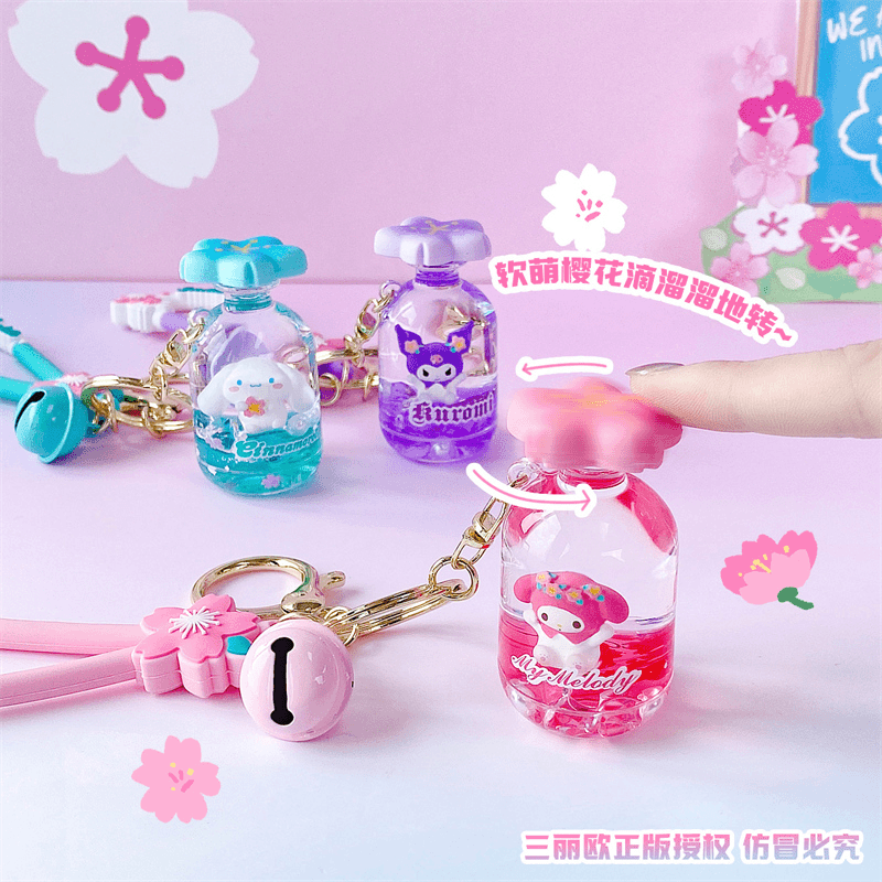 正版三丽鸥旋转漂流瓶入油钥匙扣可爱库洛米玉桂狗包挂件精致饰品