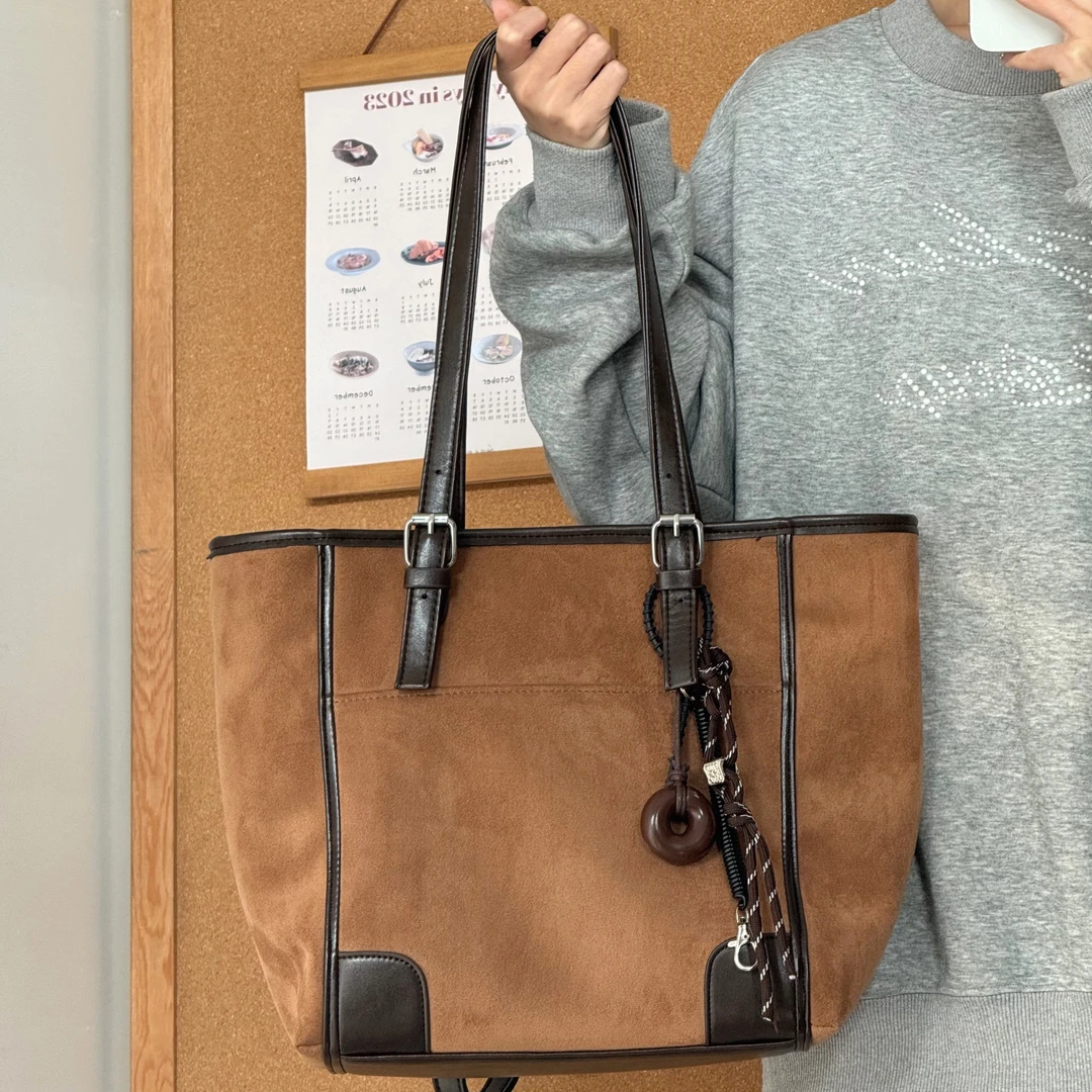 一张同学时尚百搭简约休闲通勤贝果挂件一包多背C2779棕