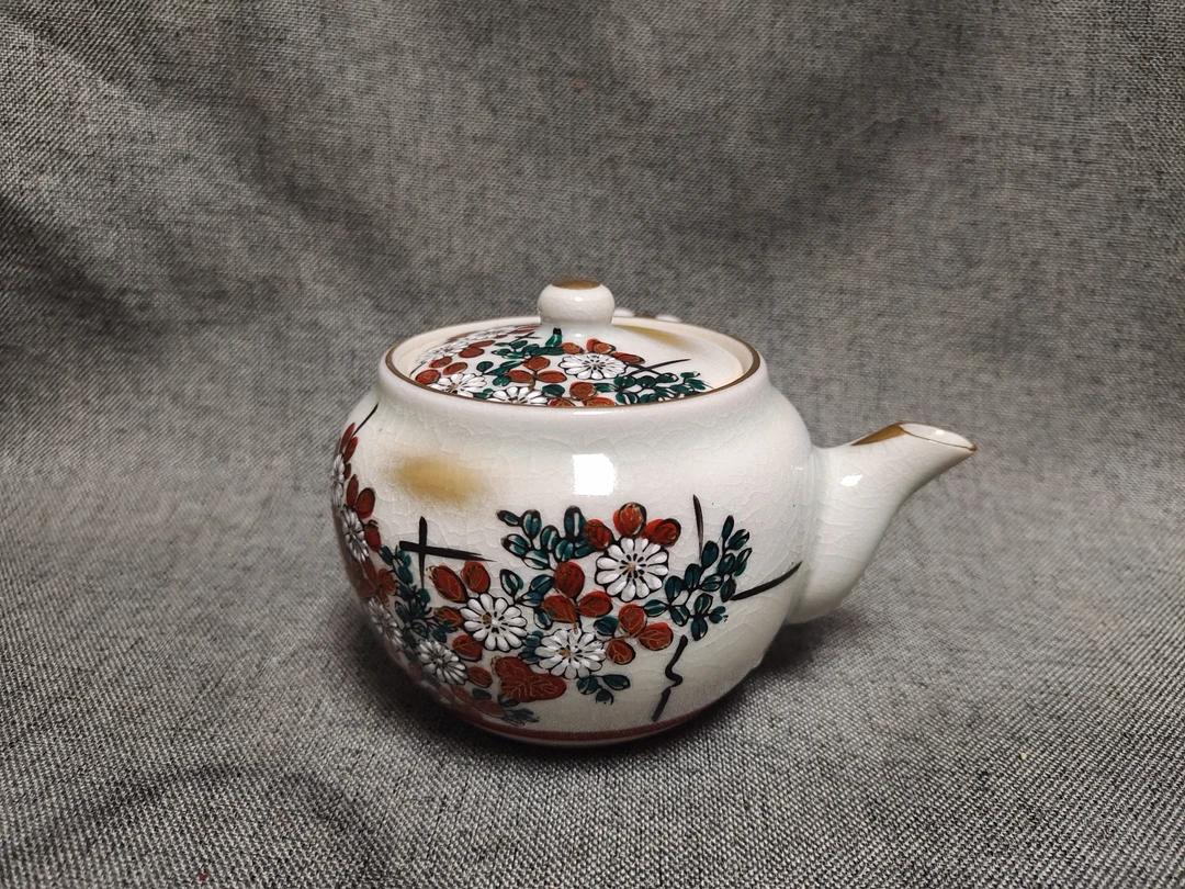 九古侧把壶01/91壶内稍有两个小黑釉