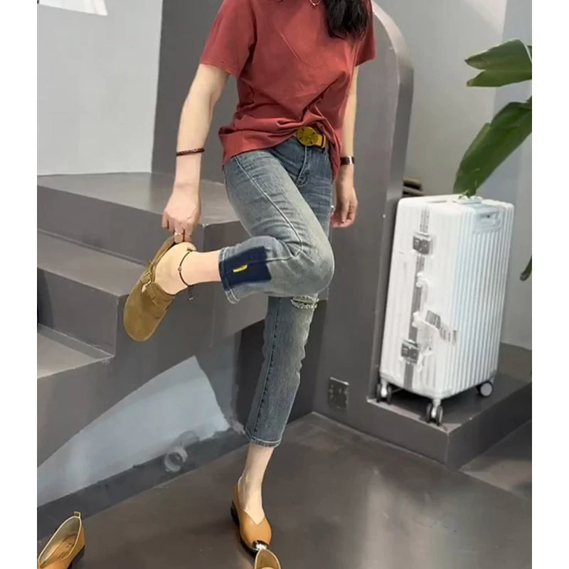 烟管裤女款爆款2024新款高腰弹力修身显瘦显高九分蓝色破洞牛仔裤
