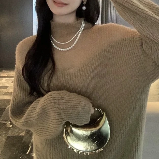 23155 祺欣家 法式镂空半高领慵懒简约风小众设计宽松显瘦针织衫