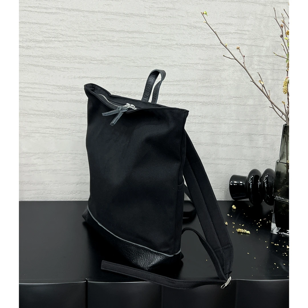 JISHE即奢24C新款帆布拼牛皮双肩慵懒风大容量旅行包潮流休闲背包