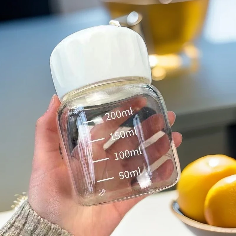 小巧可爱迷你玻璃杯透明带盖设计便携式咖啡奶茶杯带刻度胖胖杯女