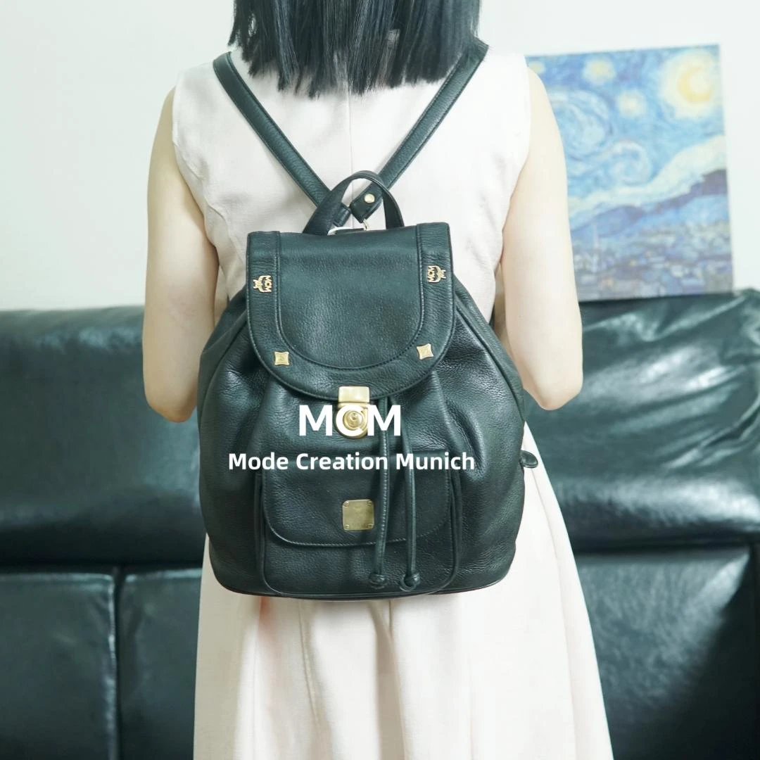 95新 MCM 黑金双肩包/ZZ09514011/4011