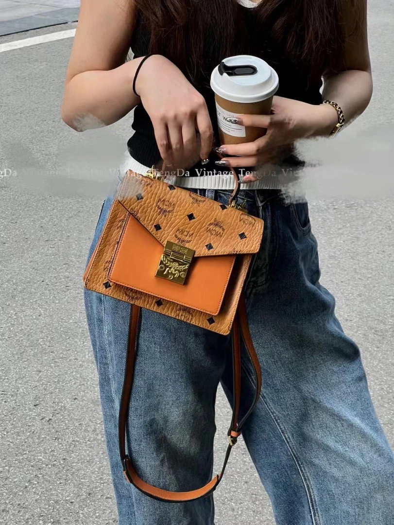 99新 MCM mcm干邑色邮差包/公价无/甄选