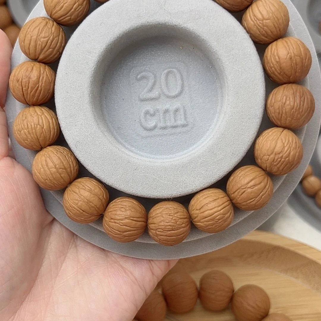 【闪购商品】猴头核桃吊坠修*14+凤羽