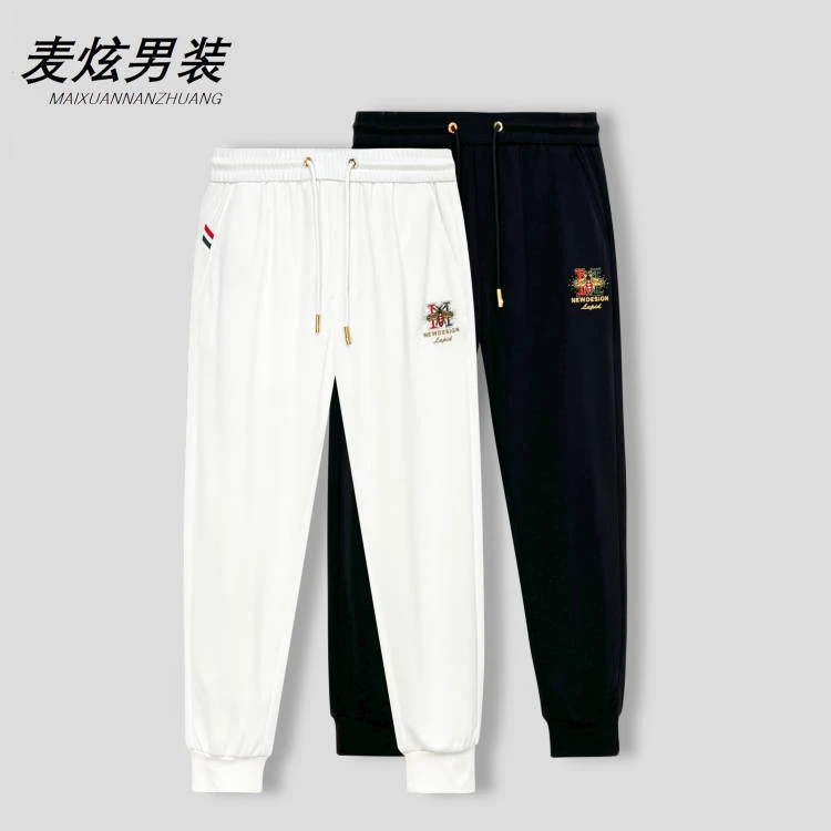 男士欧货休闲裤夏季烫钻条纹提花时尚运动显瘦高弹力裤子KZ8177