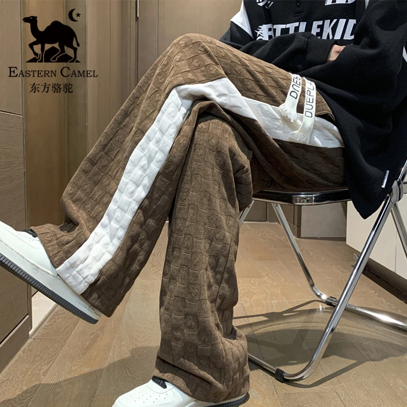 东方骆驼裤子男冬季青少年加绒加厚保暖宽松大码休闲裤高街卫裤潮