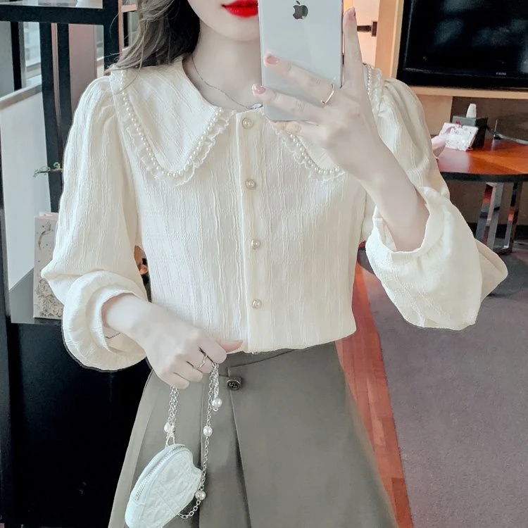 K828秋季新款法式钉珠娃娃领花边泡泡袖衬衫女别致小香风长袖上衣