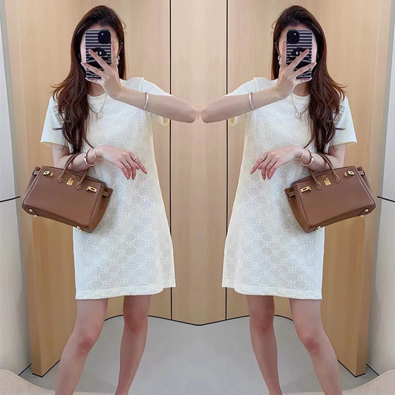 2023夏季新品圆领显瘦通勤拼接气质时尚百搭针织水溶花连衣裙