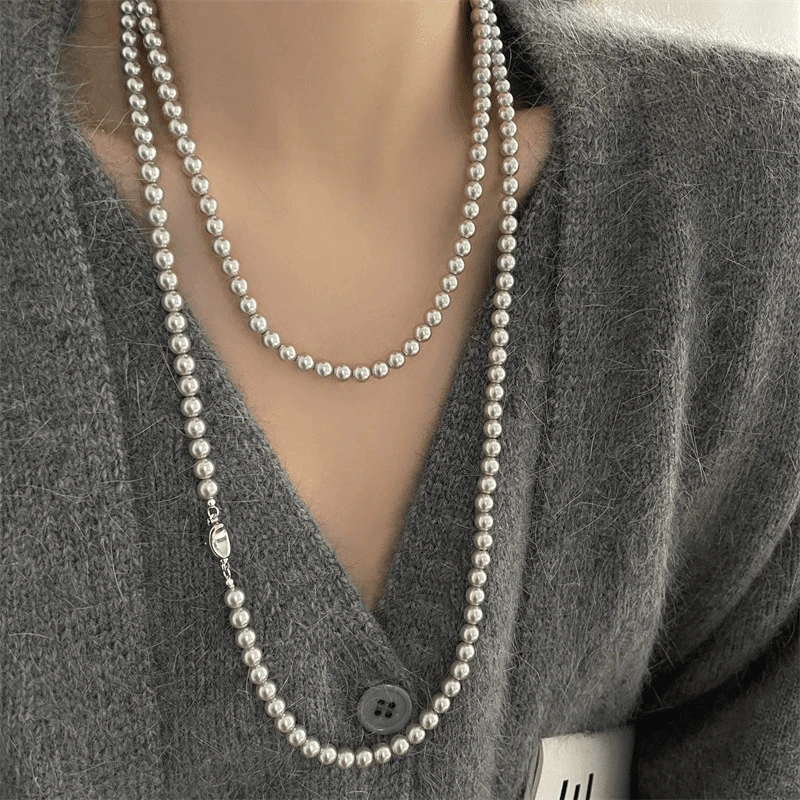 铜仿珍珠项链 秋冬珠珠元宝扣长款毛衣链女2024年新款爆款项链潮
