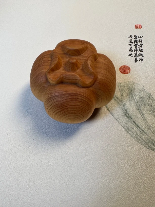 崖柏陈化料木雕柿子手把件原木雕刻