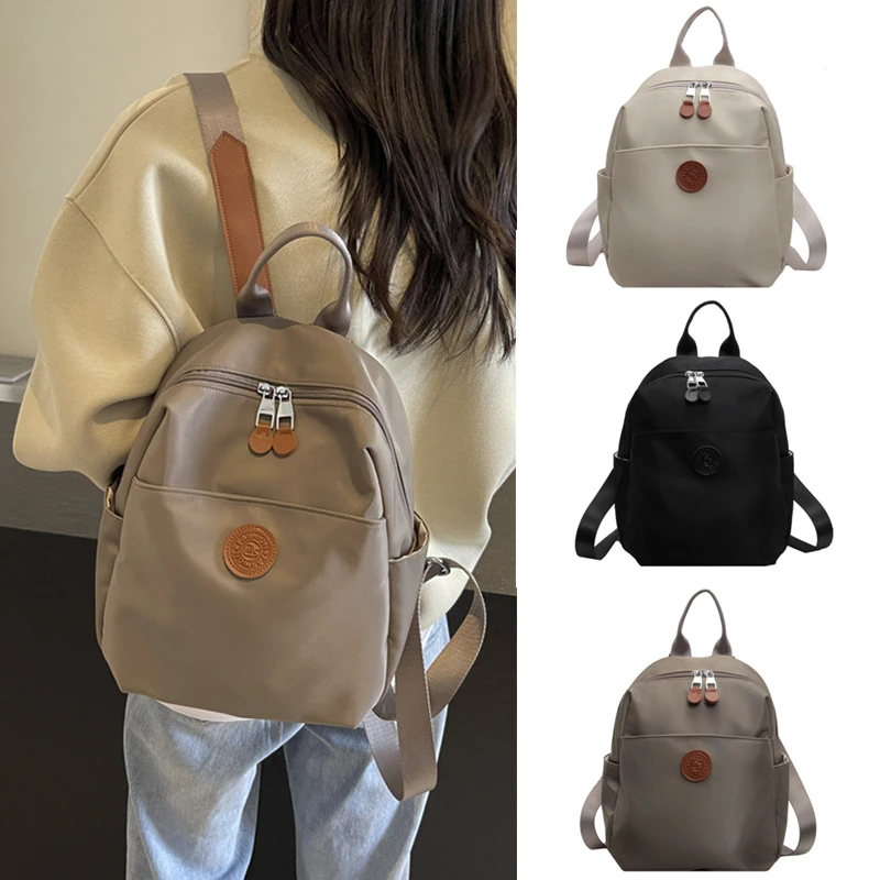 春季新款轻便透气防水背包时尚双肩包包大容量防水百搭女士包包潮