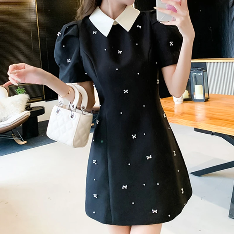 新款法式显瘦收腰连衣裙2025夏季钉珠赫本时尚翻领泡泡气质裙子