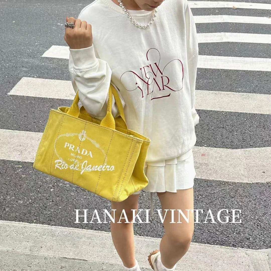 95新 Prada/普拉达 花绮二店/Prada黄色沙滩手提包/95新