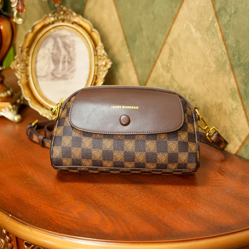 2024春夏新款复古女士单肩斜挎包轻奢软皮妈妈手机包翻盖小包包