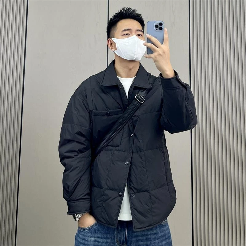 雪中飞300斤加大码冬季轻薄保暖羽绒服男潮流休闲百搭简约宽松加