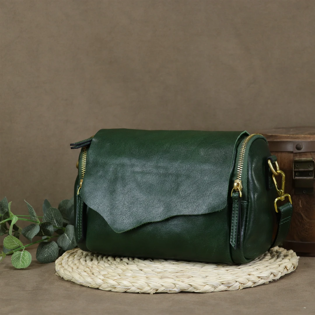 头层植鞣牛皮女士时尚休闲单肩斜挎翻盖波士顿包包