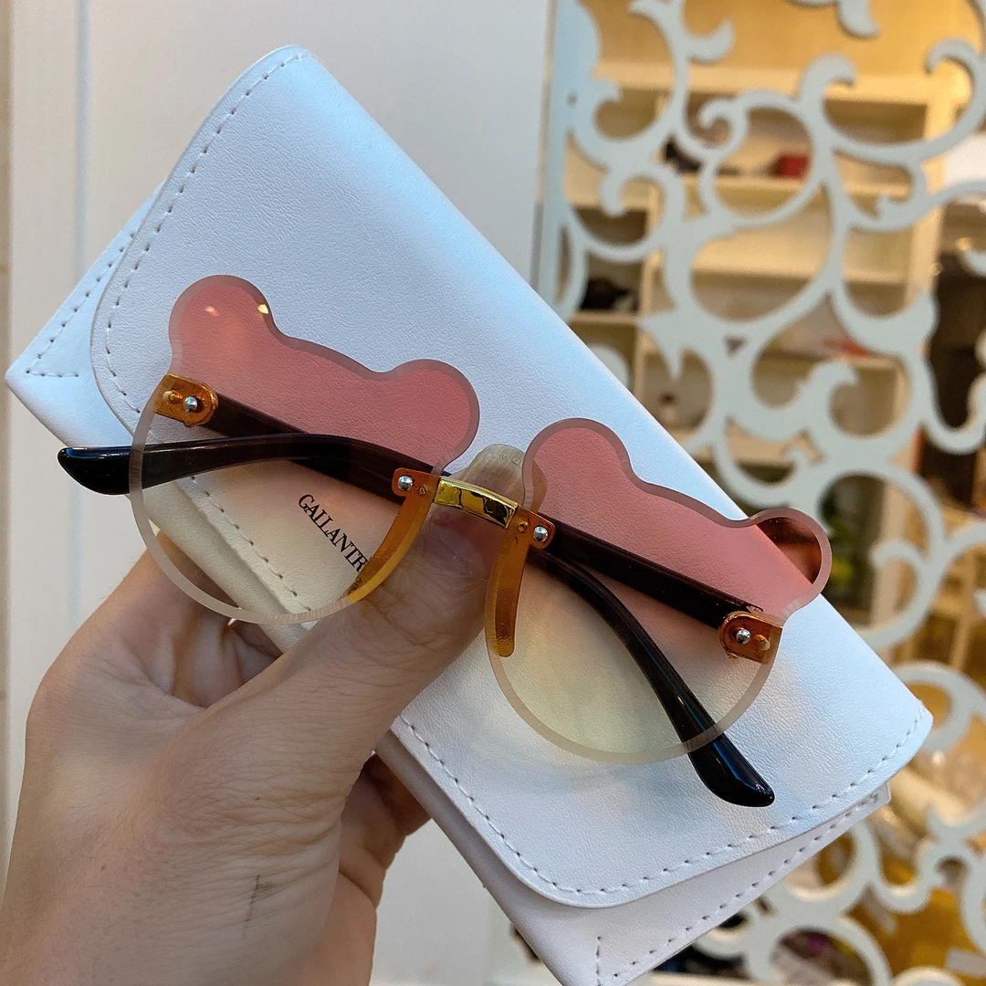 儿童玩具眼镜卡通可爱变色太阳镜新款韩版无框小脸猫眼墨镜女