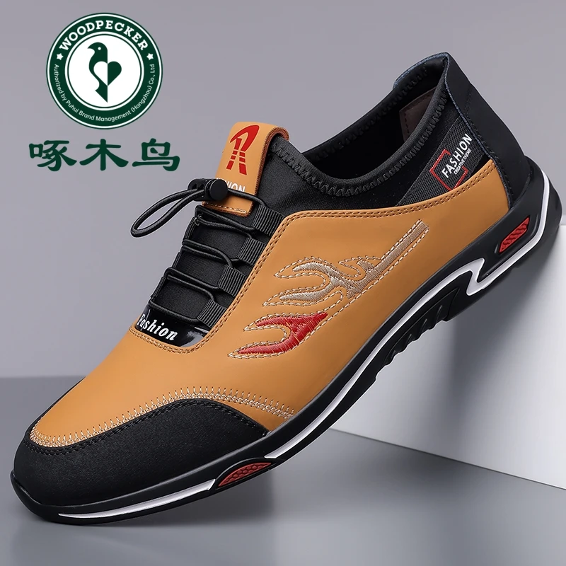 啄木鸟休闲皮鞋新款男士时尚百搭轻便防滑套脚软底舒适运动休闲鞋