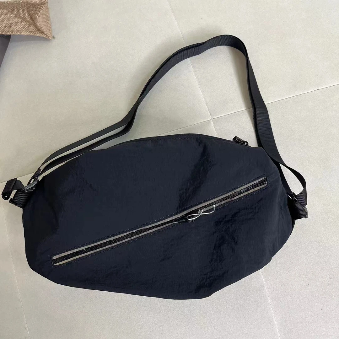 百搭高级感斜跨帆布饺子包 H1258