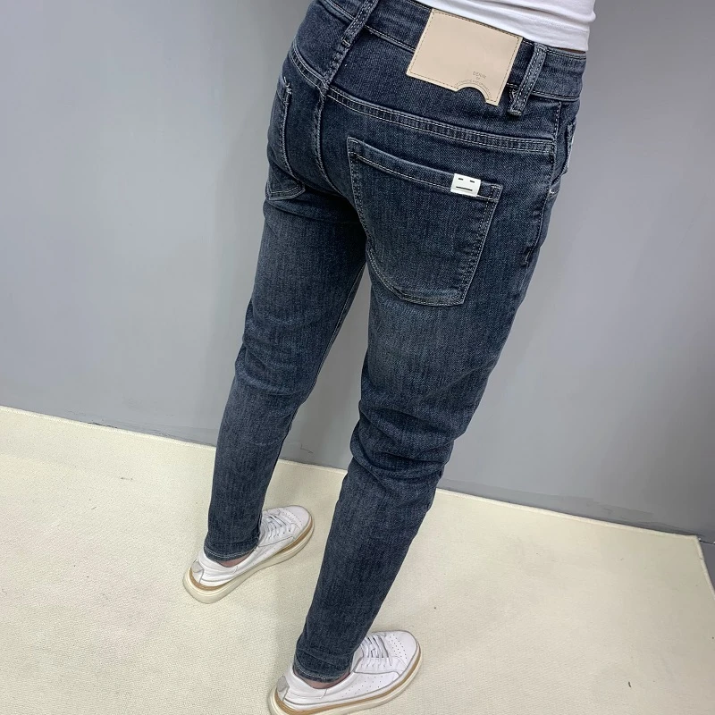 牛仔长裤男秋季爆款高档潮流百搭修身小脚复古水洗时尚痞帅九分裤