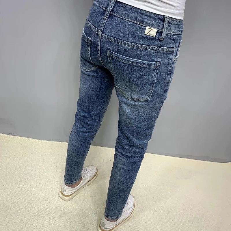 潮流牛仔裤男款秋季新款休闲百搭复古弹力修身小脚蓝色水洗九分裤