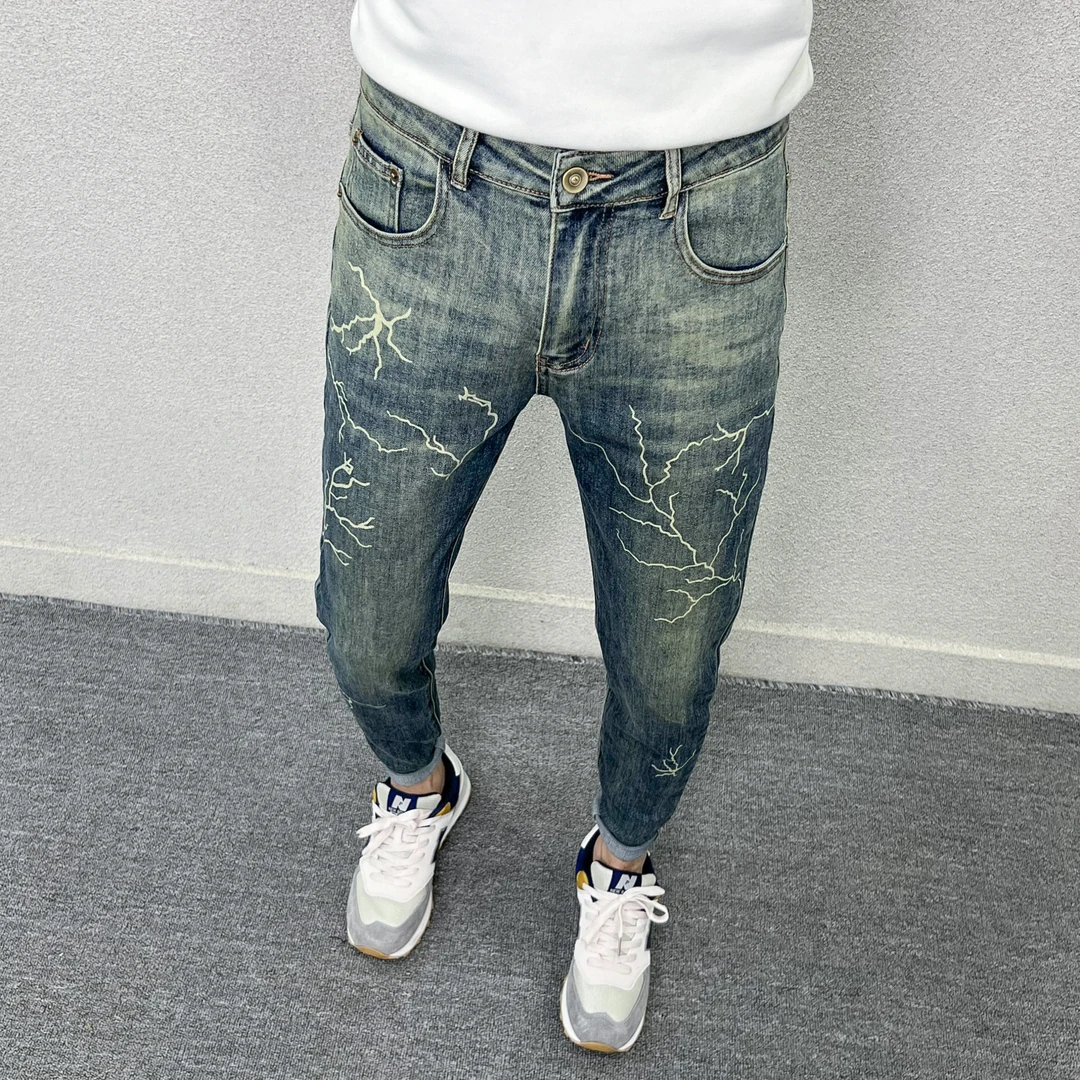 印花牛仔长裤男秋冬爆款美式复古修身小脚个性百搭痞帅耐磨长裤子