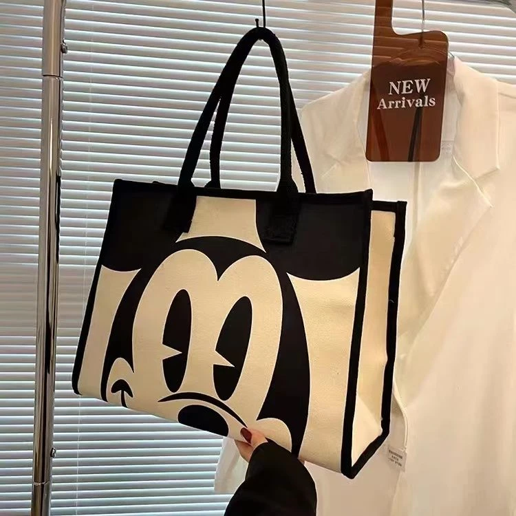 大容量帆布包包女夏季新款时尚单肩包通勤托特包卡通手提袋妈咪包