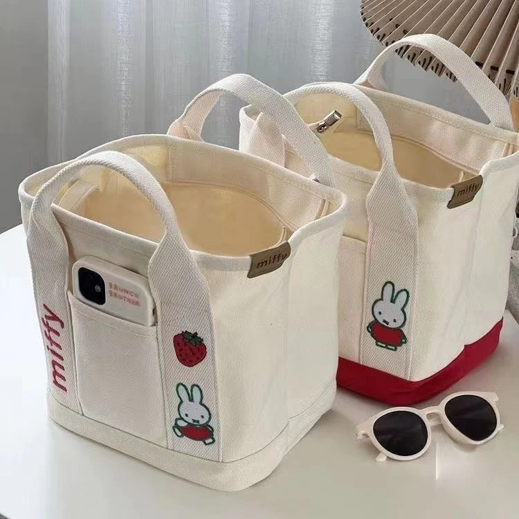 新款卡通兔子刺绣加厚帆布手提袋多口袋便携单肩包宝妈外出手拎包
