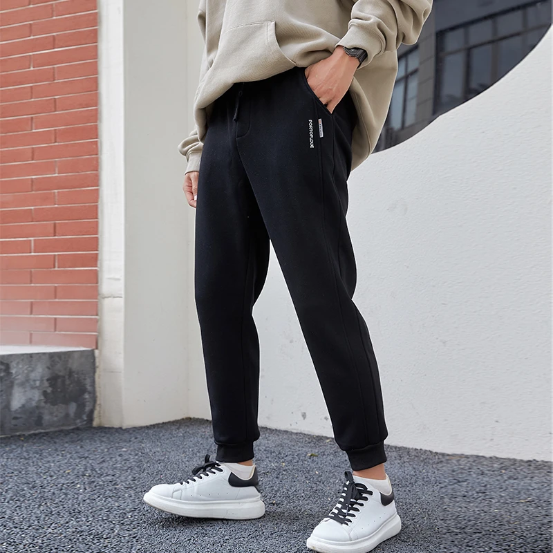 商务春秋新款男纯色宽松男束脚卫裤潮流垂感针织运动裤百搭休闲裤