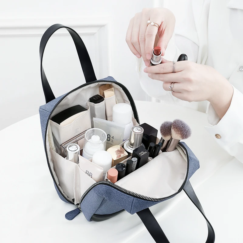 即刻旅行2024高档手提牛仔化妆包新款网红女便携式防水收纳包