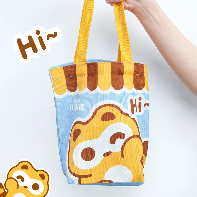 小浣熊帆布包小巧卡通百搭手提包女学生饭盒袋简约手提袋子上班族