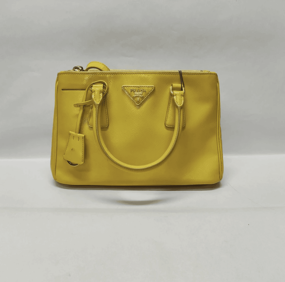 95新 Prada/普拉达 黄色杀手手提包—zs3076